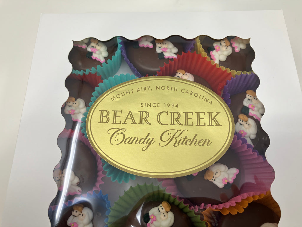 Bear Creek Candy Kitchen product packaging with colorful candy designs on a white background