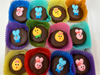 Chocolate candies with animal designs in colorful paper cups