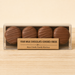 Temporary package mockup showing four milk chocolate-covered Oreos